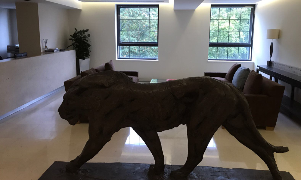 Inside office with lion statue